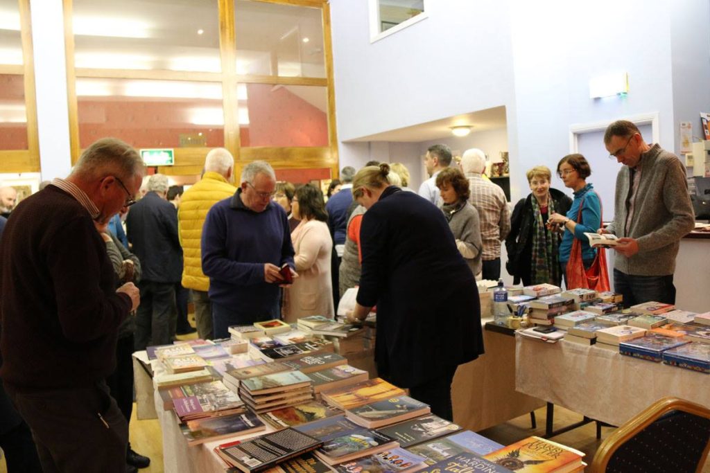 visitors buying books at Allingham Arts Festival