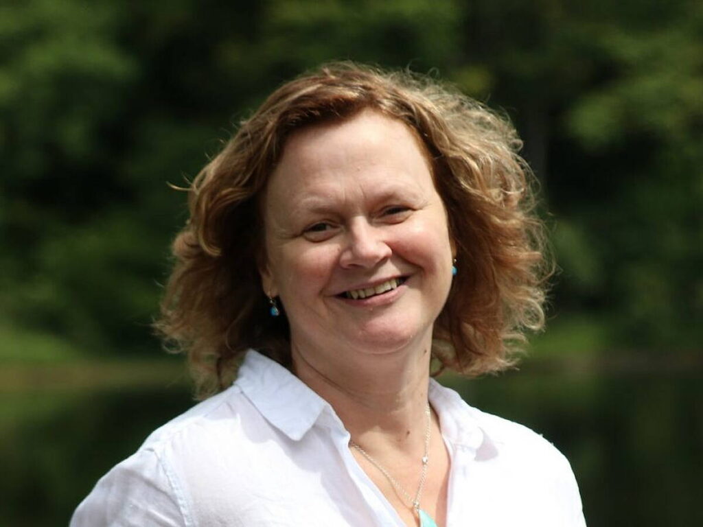 A portrait photo of Denise Blake, poet
