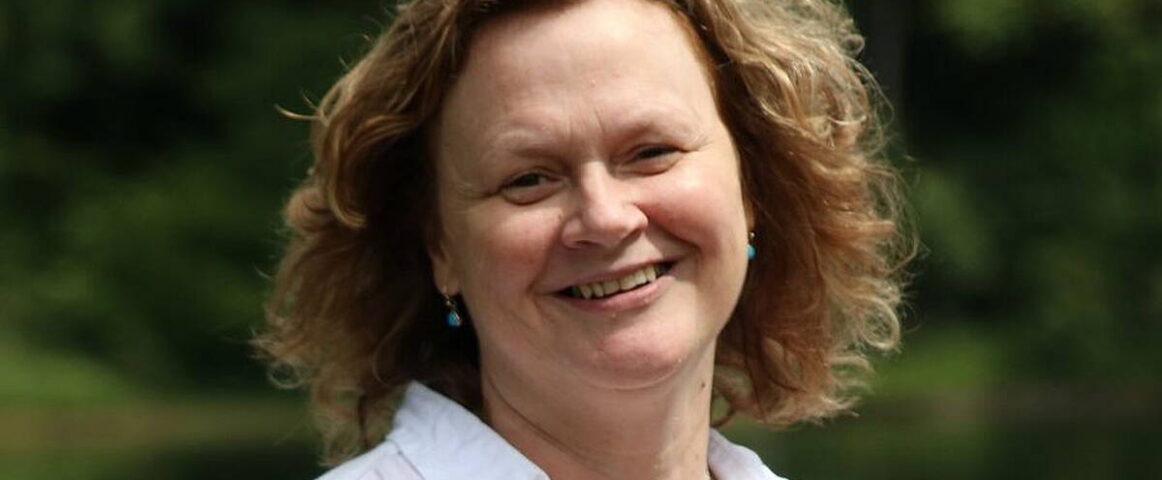 A portrait photo of Denise Blake, poet